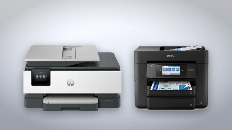 HP OfficeJet Pro 8125 in white and gray beside the black Epson WorkForce Pro WF-4830, both seen from the front